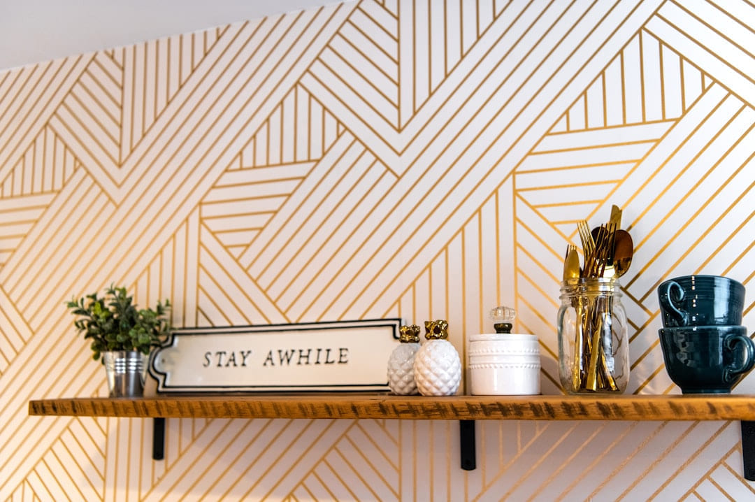 white and brown wooden wall mounted shelf on Hammer & Home