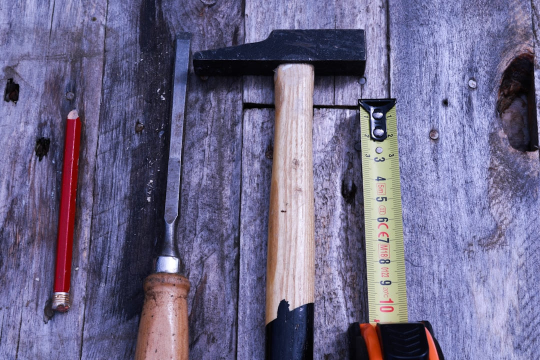 brown and black handle hammer on Hammer & Home